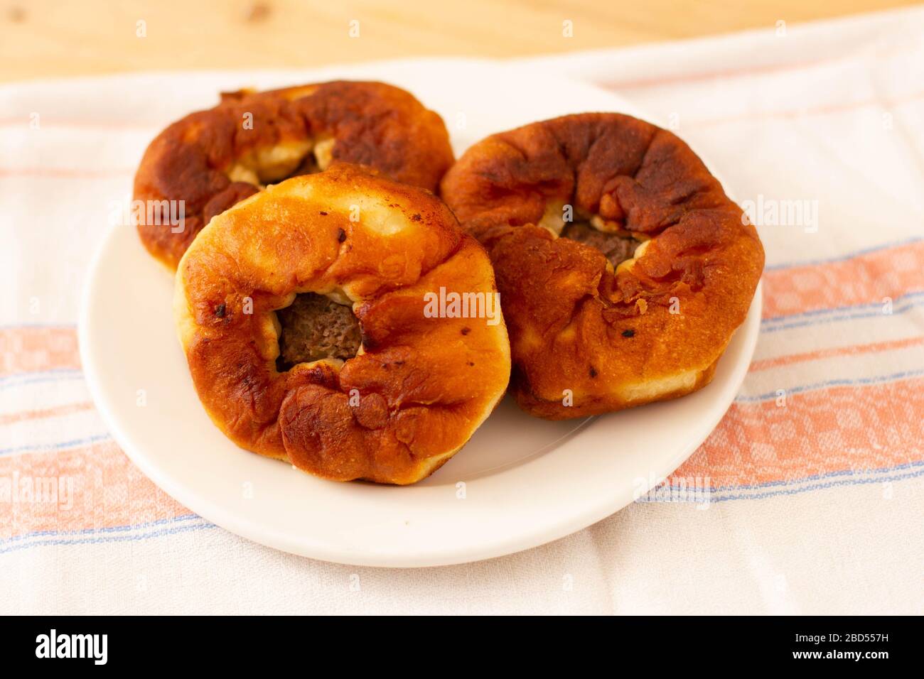 Meat pies. The traditional Kazakh, Tatar and Bashkir food - belyashi. Stock Photo