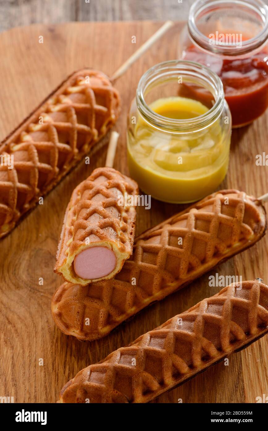 Waffle Corn Dogs On Wooden Background Trendy Street Food Stock Photo Alamy