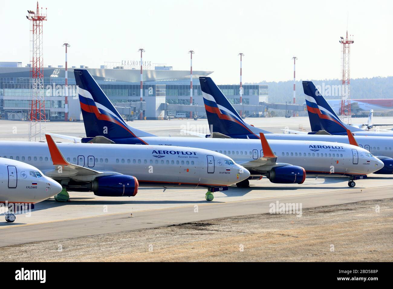 KRASNOYARSK TERRITORY, RUSSIA - APRIL 7, 2020: Aeroflot passenger planes at  Krasnoyarsk International Airport. Russia has halted all international  flights since March 27, 2020, amid the ongoing COVID-19 coronavirus  pandemic, except for