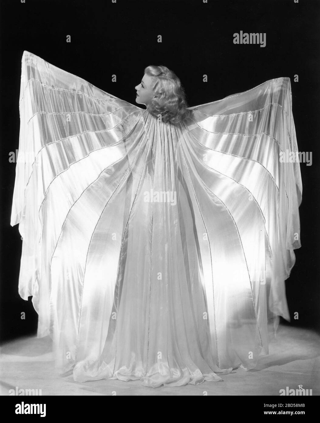 GINGER ROGERS models costume for SHALL WE DANCE 1937 director MARK SANDRICH music GEORGE GERSHWIN lyrics IRA GERSHWIN RKO Radio Pictures Stock Photo