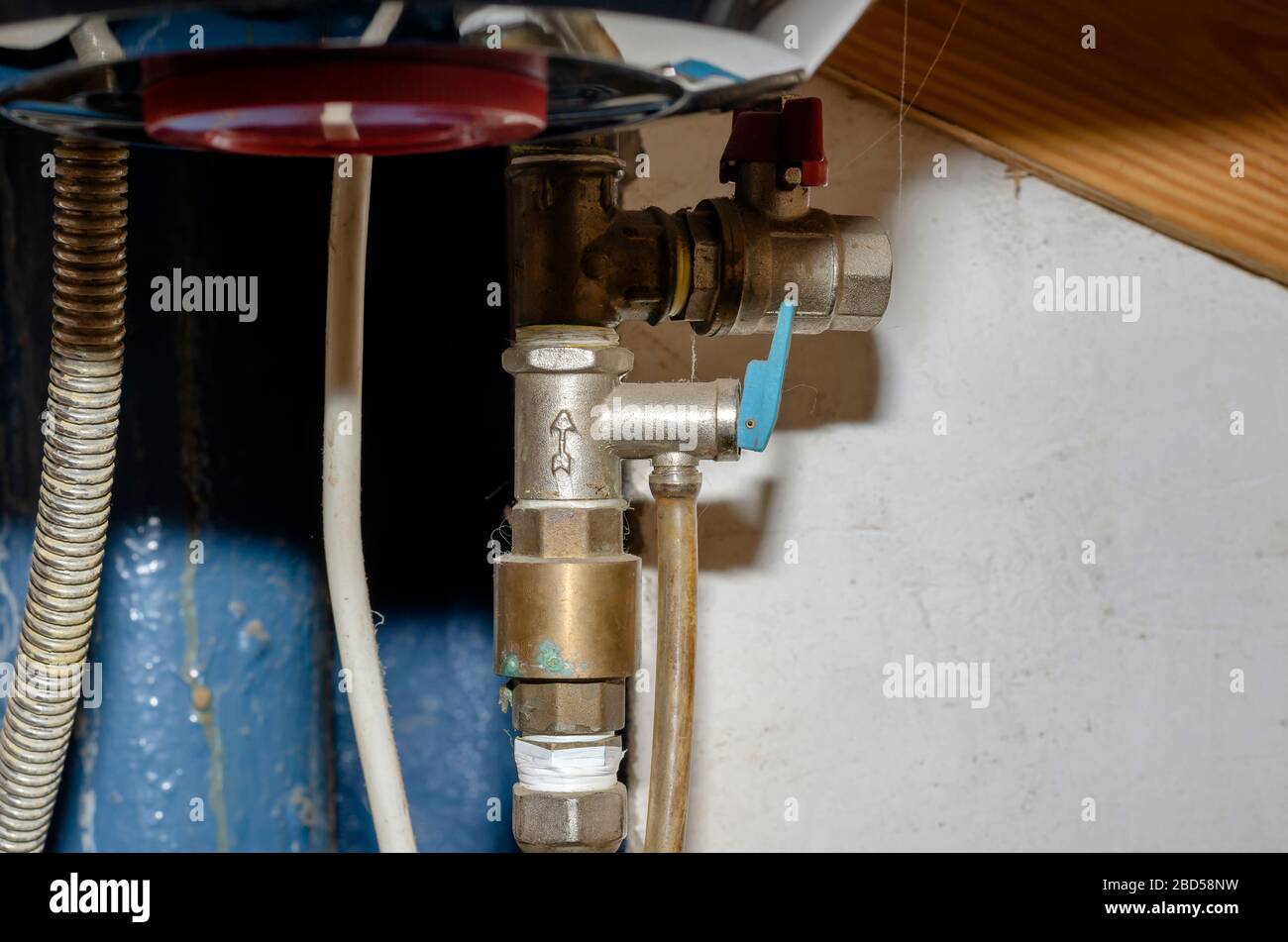 Safety valve for electric water heater. Dusty piping of a domestic hot