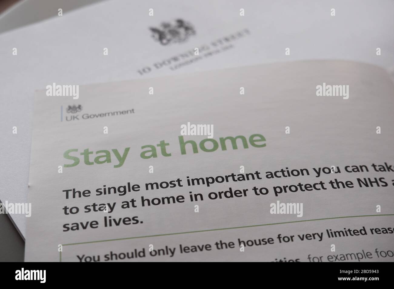 A letter and leaflet from the Government sent to households in Britain giving advice & instructions during the Coronavirus covid19 pandemic April 2020 Stock Photo