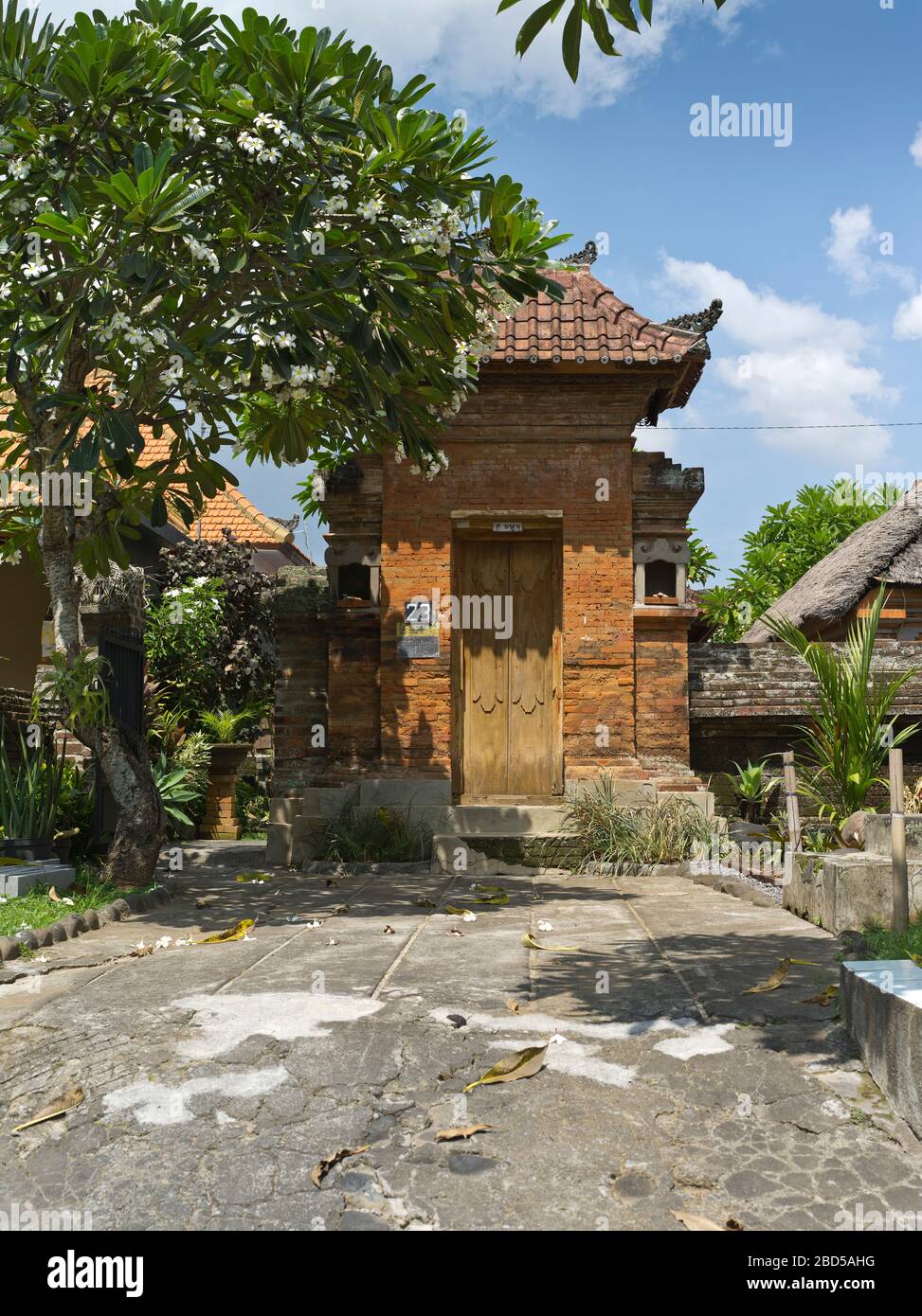 dh House compound main entrance BALI INDONESIA Entryway to residential property gardens home Stock Photo