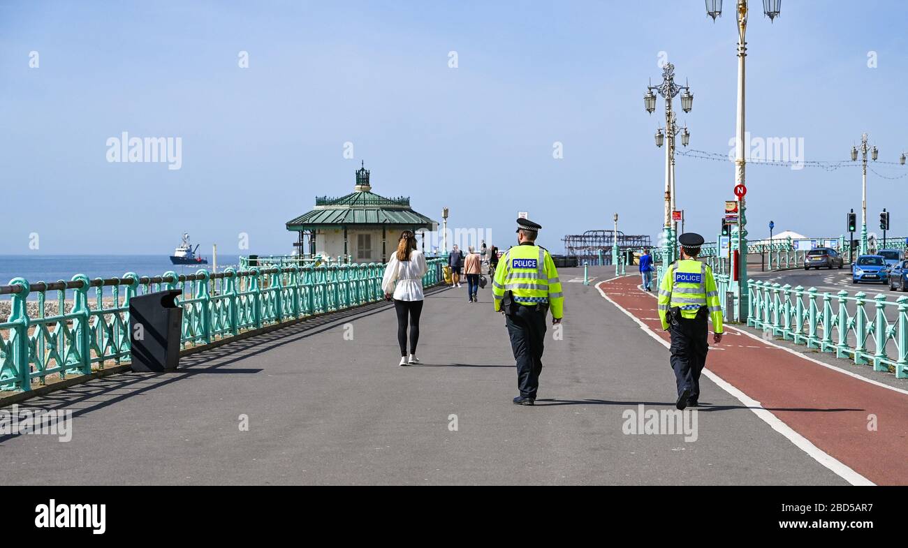 Brighton, UK. 7th April 2020 - Police check out Brighton seafront on day fifteen of the governments lockdown in Britain during the Coronavirus COVID-19 pandemic crisis  . Credit: Simon Dack / Alamy Live News Stock Photo
