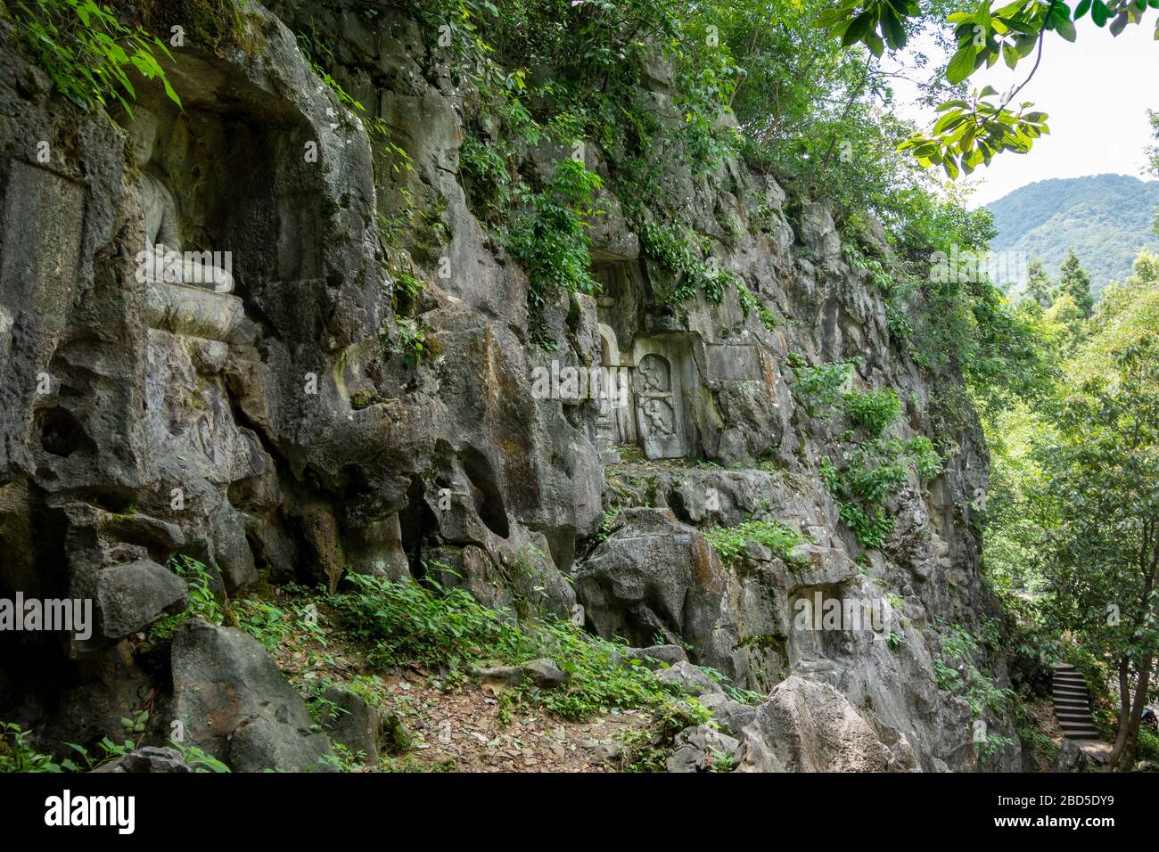 rock-cut sculpture, Felai Feng grottoes, Lingyin Temple, West Lake, Hangzhou, Chins Stock Photo
