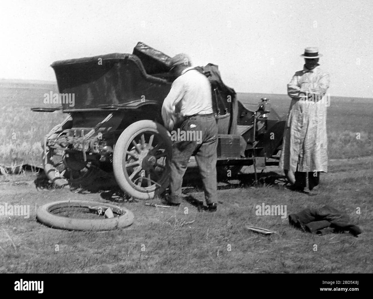 Fixing a puncture, early 1900s Stock Photo - Alamy