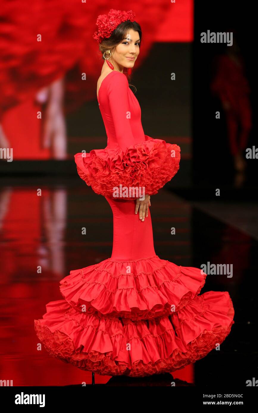 SEVILLA, SPAIN - JAN 30: Model Clara Roldan wearing a dress from the Alma collection by designer Jorge Sanchez as part of the SIMOF 2020 (Photo credit: Mickael Chavet) Stock Photo