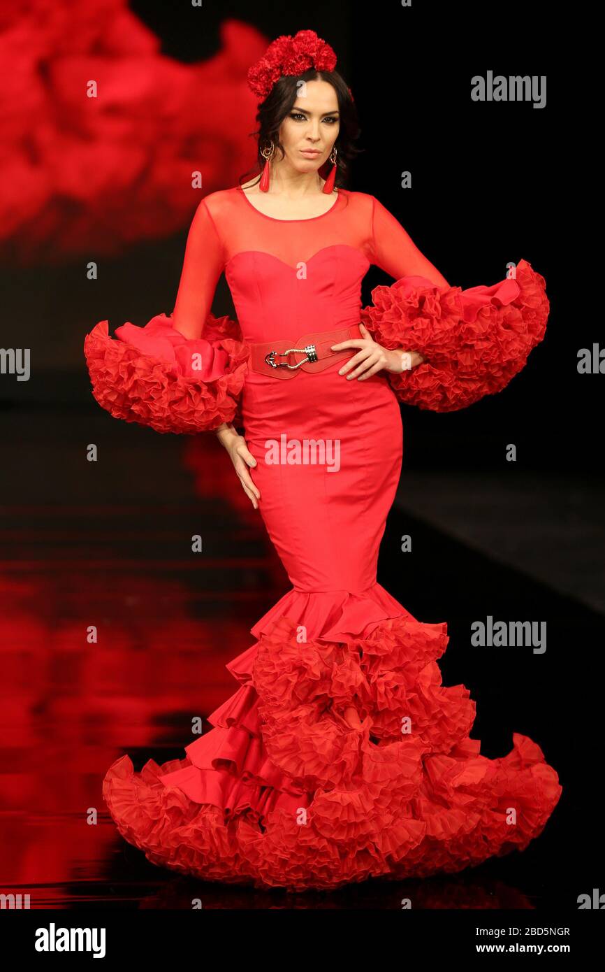 SEVILLA, SPAIN - JAN 30: Model Maria Ramos Rivas wearing a dress from the Alma collection by designer Jorge Sanchez as part of the SIMOF 2020 (Photo credit: Mickael Chavet) Stock Photo