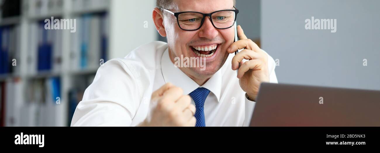 Smiling employee wearing glasses Stock Photo Alamy