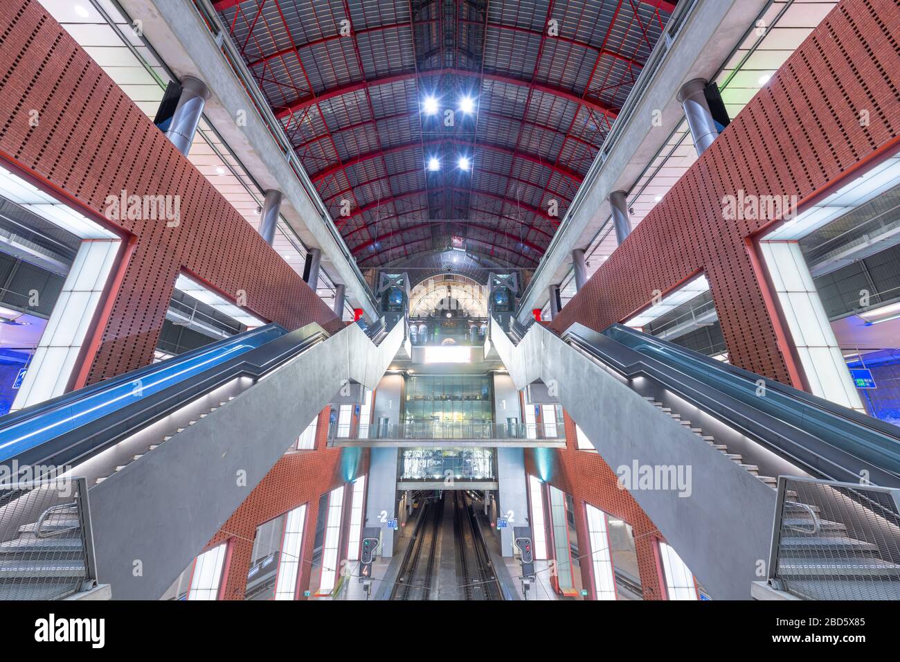 ANTWERP, BELGIUM - MARCH 5, 2020: Antwerpen-Centraal Railway Station escalators and platforms. The station dates from 1905. Stock Photo