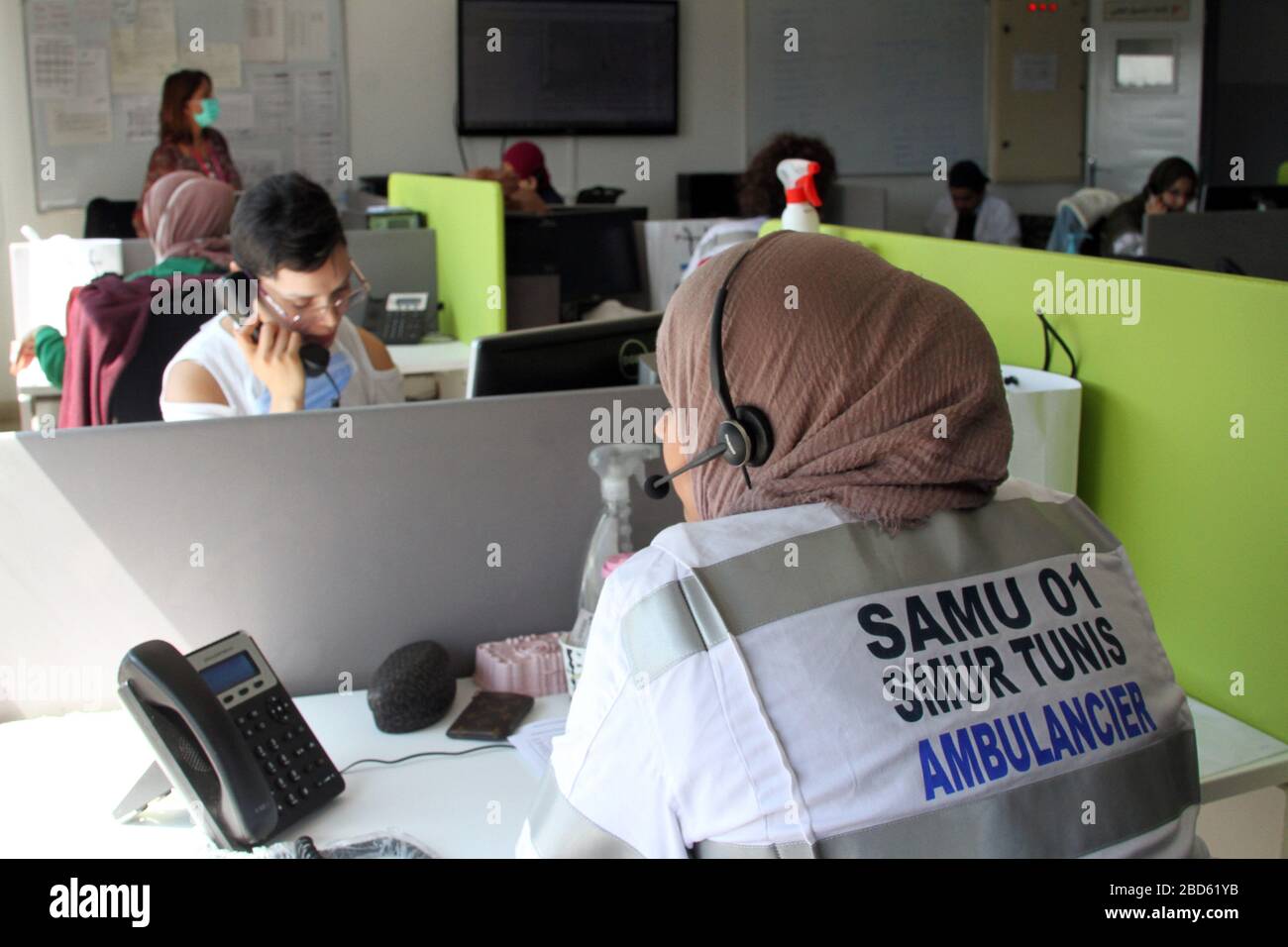 A medical assistant attending to COVID-19 disease-related calls during operations.SAMU Tunisia (Urgent Medical Aid Service), are busier than before attending to the increasing COVID-19 patients in the capital Tunis. Stock Photo