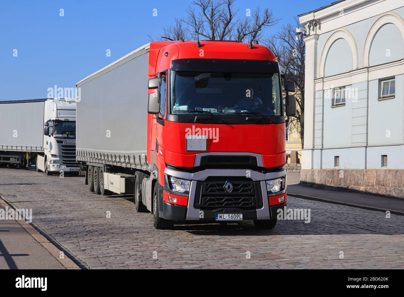 Red Renault Trucks T semi trailer driving on cobbled Helsinki street after  arrival in Port of Helsinki, Finland on sunny day of spring. April 7, 2020  Stock Photo - Alamy