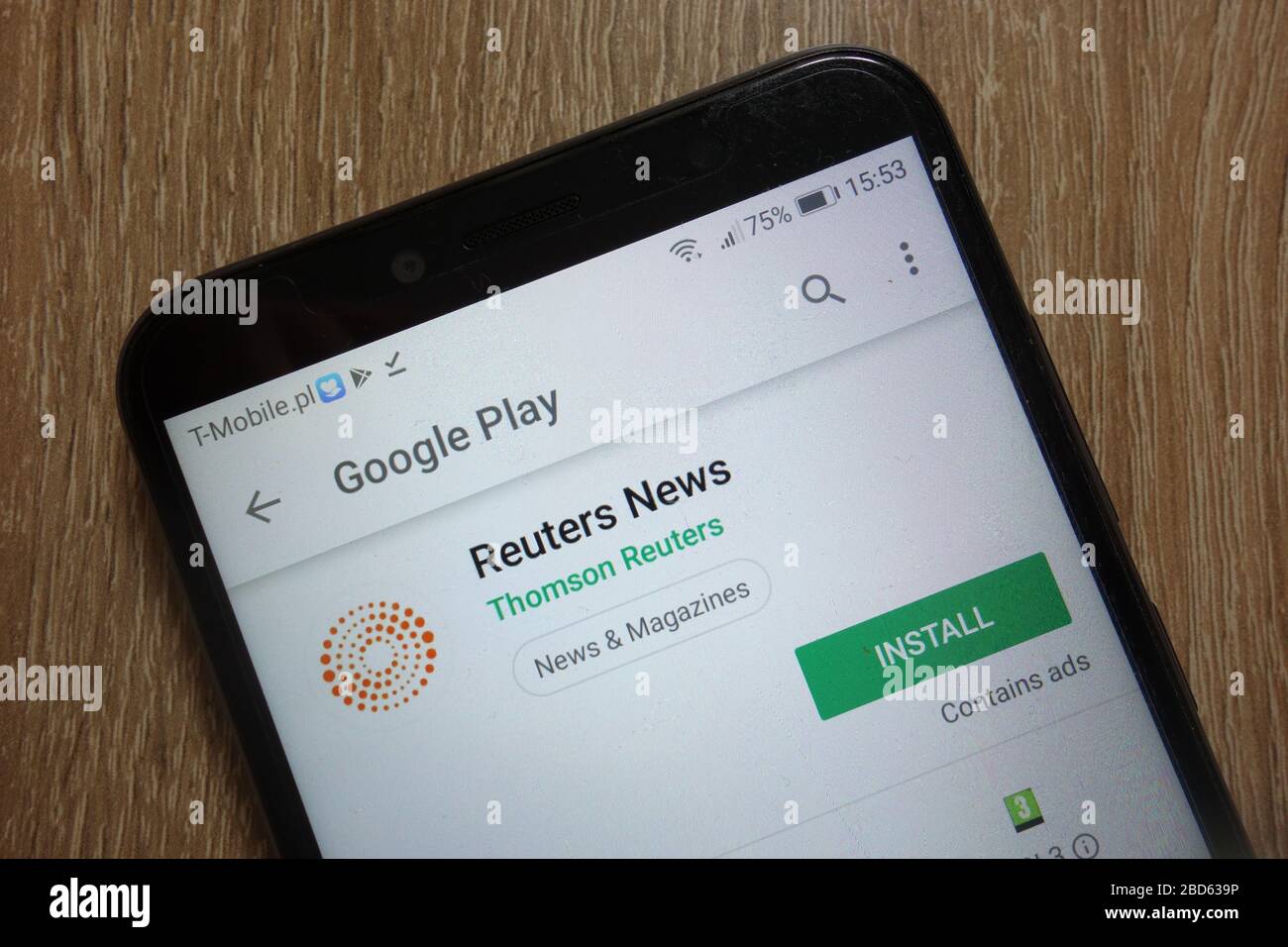 Reuters News app on Google Play website displayed on smartphone Stock Photo