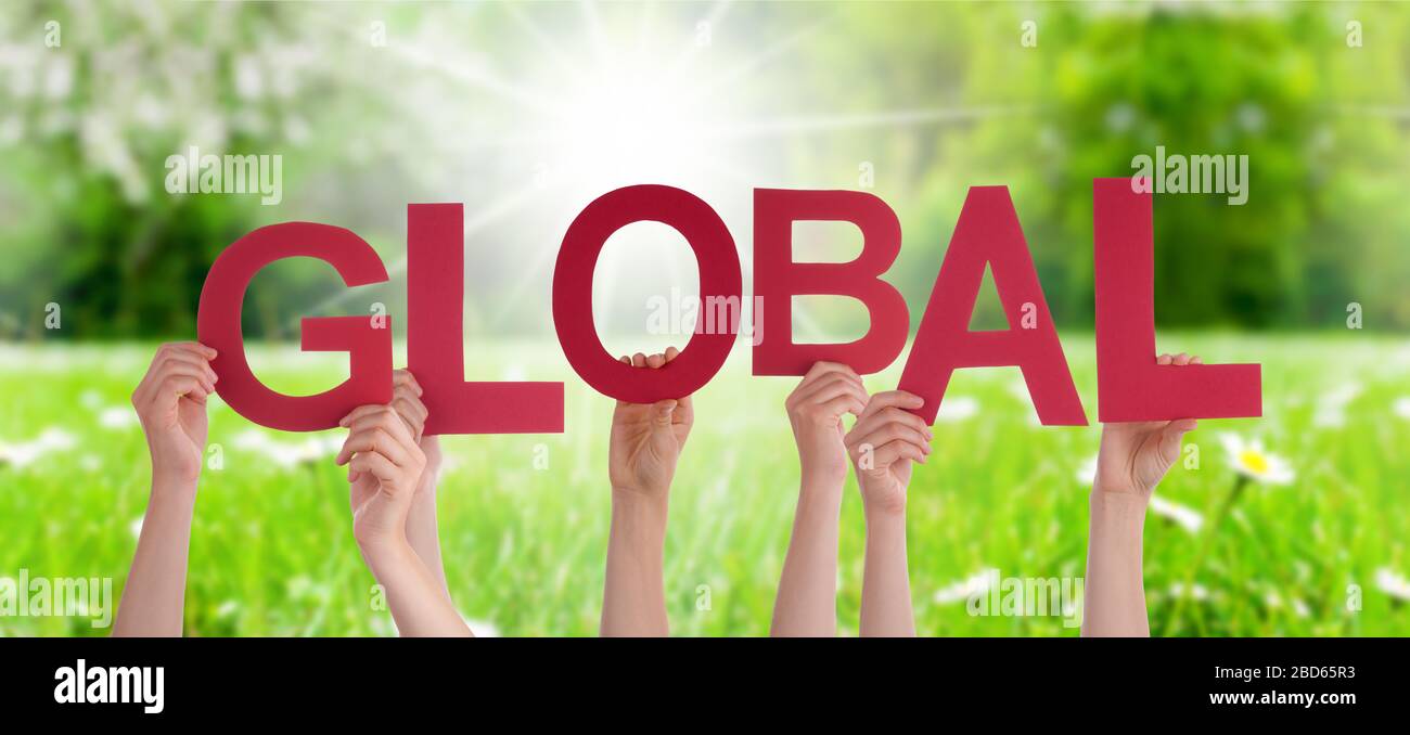 People Hands Holding Word Global, Grass Meadow Stock Photo