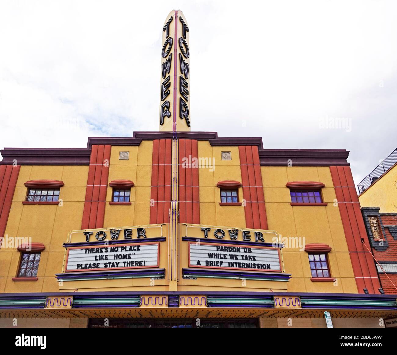 The event venue Tower Theater in Bend, Oregon, displaying 'Stay Home' signs during the Coronavirus pandemic of 2020. Stock Photo