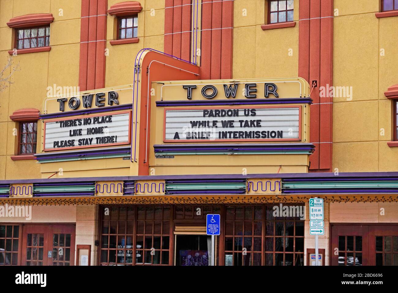The event venue Tower Theater in Bend, Oregon, displaying 'Stay Home' signs during the Coronavirus pandemic of 2020. Stock Photo