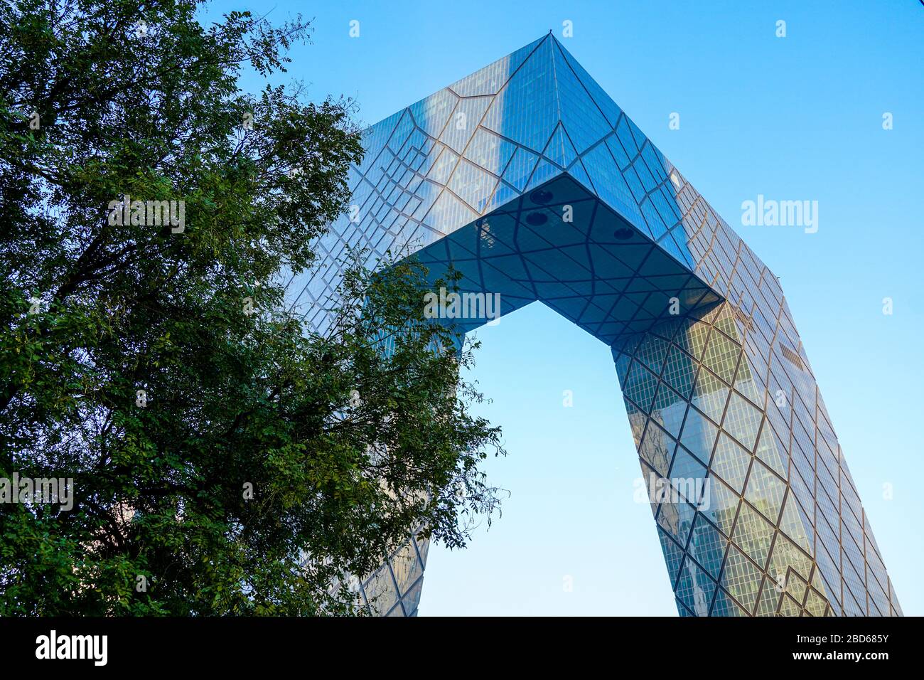 The CCTV Tower of Beijing, China. CCTV Headquarters during blue day in Beijing, The CCTV building is a loop of six horizontal and vertical sections with a total floor space of 473,000 sq. April 4th, 2020 Stock Photo