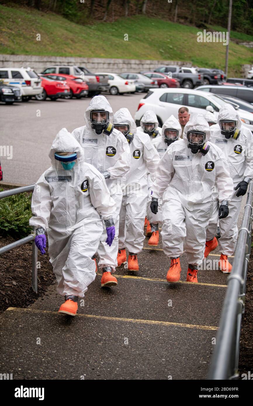 West Virginia Army National Guard soldiers arrive to assist medical staff with COVID-19, coronavirus testing at Eastbrook Center nursing home April 6, 2020 in Charleston, West Virginia. Stock Photo