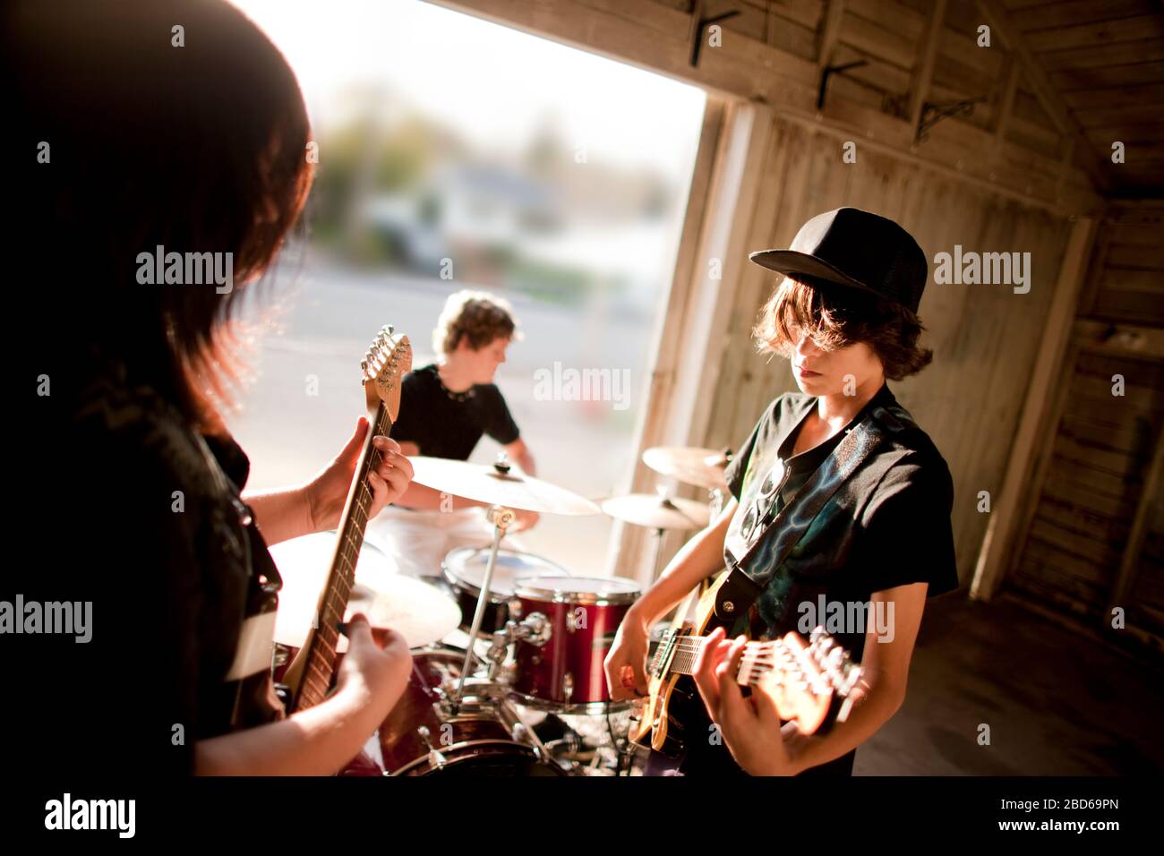 Teenage boy playing drums hires stock photography and images Alamy