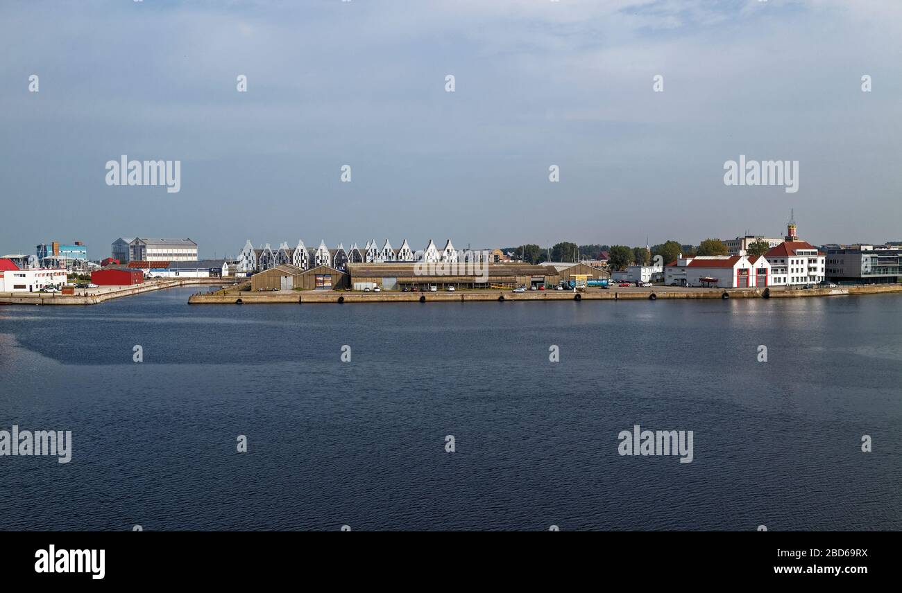 Looking towards the Coast from the inner harbour Complex at Dunkirk with a mix of Commercial and Residential Buildings visible. Stock Photo