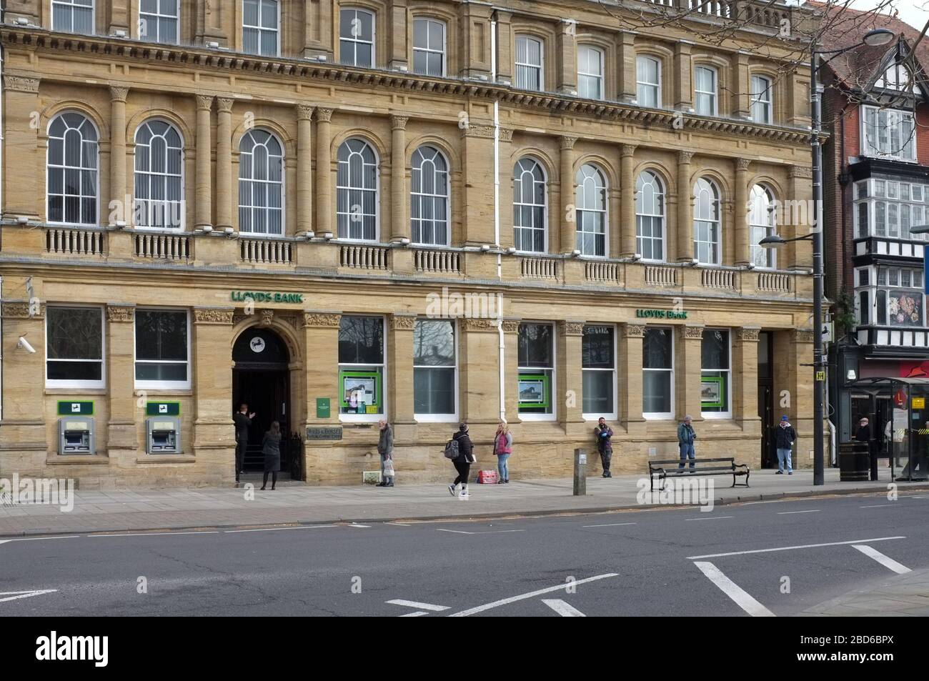 Social distancing, due to the Covid 19 outbreak, outside Salisbury's Lloyds bank. Wiltshire UK. April 2020. Stock Photo
