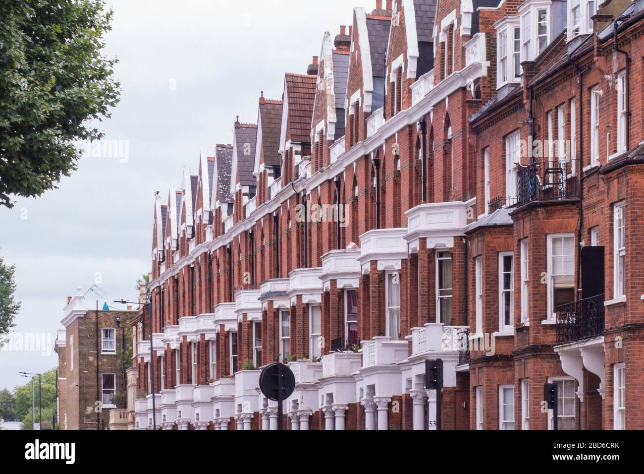 Attractive row of grand townhouses in Kensington, London Stock Photo