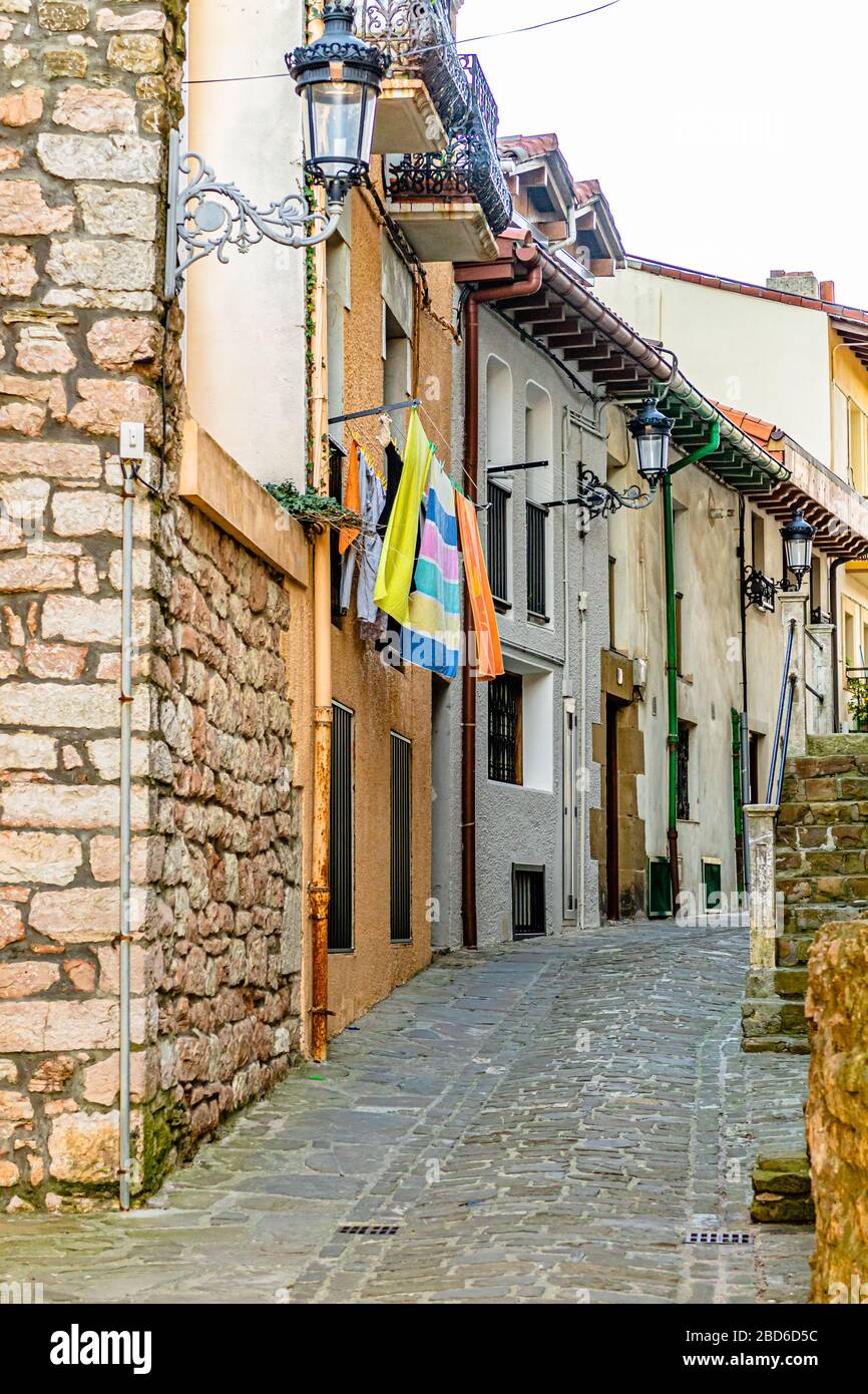 Houses along a cobbled street in the medieval town centre of Zumaia, Gipuzkoa, Basque Country, north Spain. February 2017. Stock Photo