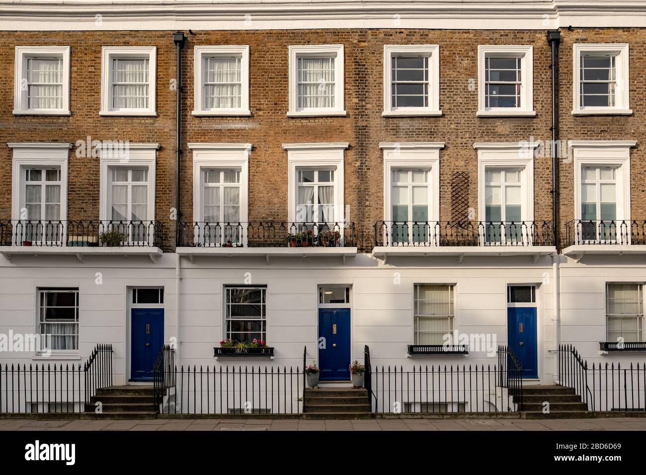 Attractive London townhouses in Kensington, London UK Stock Photo