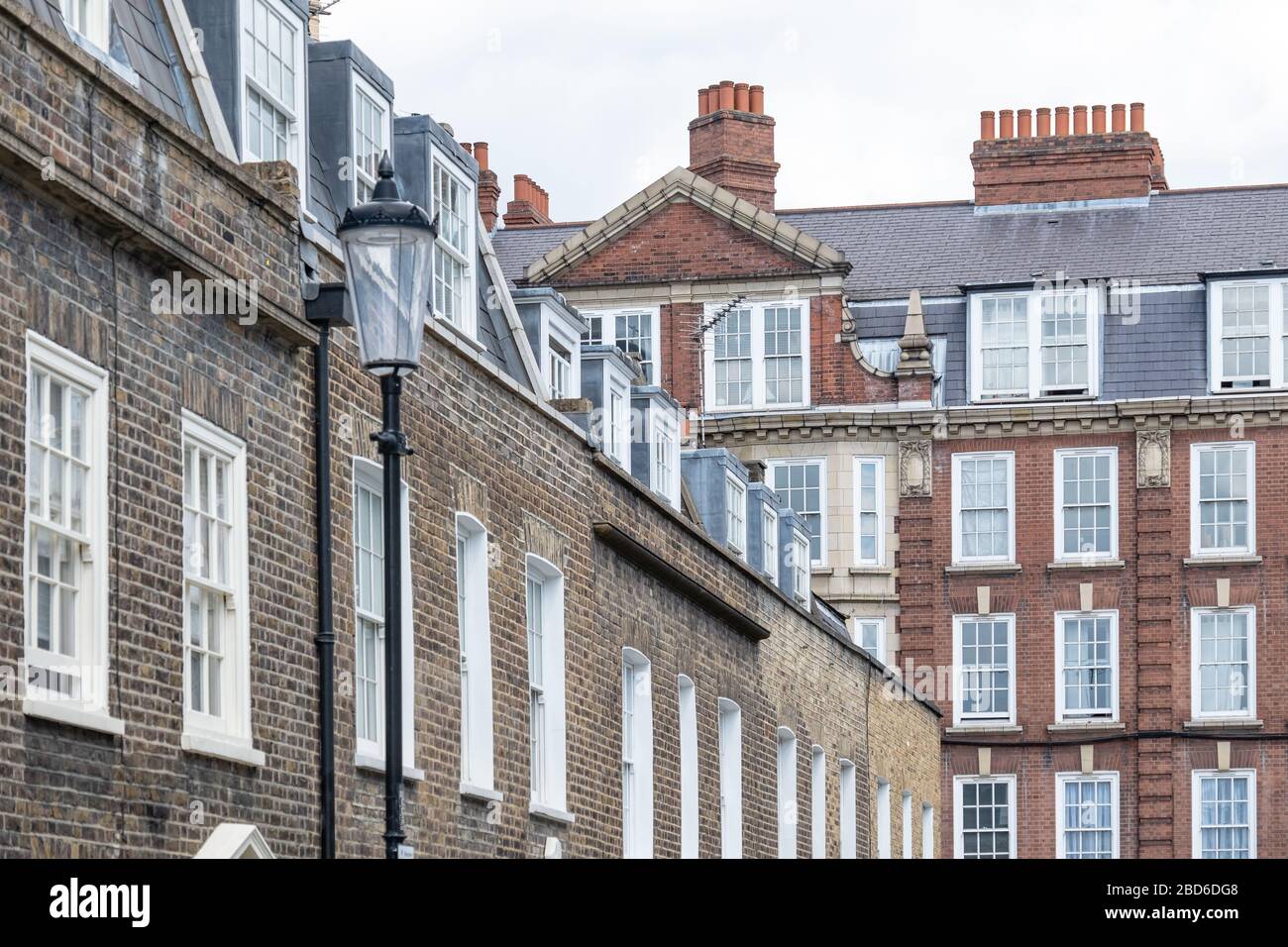 Attractive row of grand townhouses in Kensington, London Stock Photo