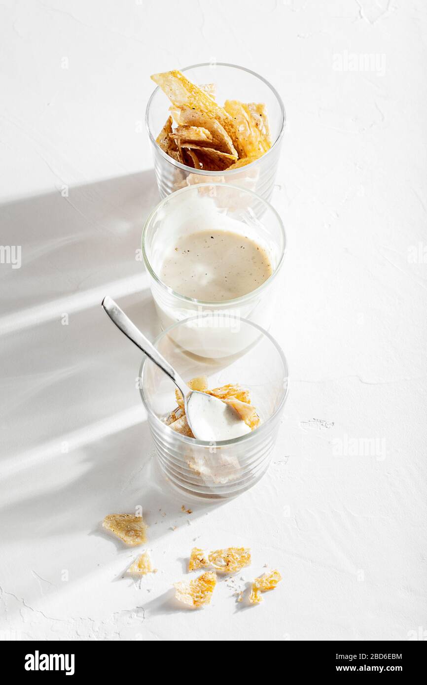 Homemade spicy pita bread lavash chips with olive oil and spices with