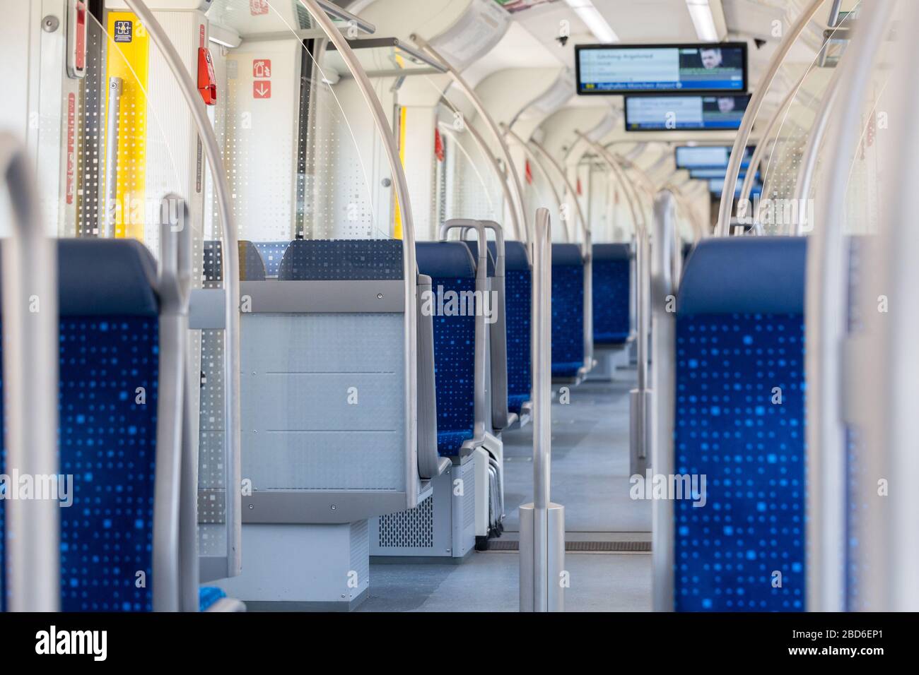 Interior of an empty Munich public transport train (S-Bahn / S Bahn). Due to Covid-19 the usage of public transport in Germany dropped by 80 to 90%. Stock Photo