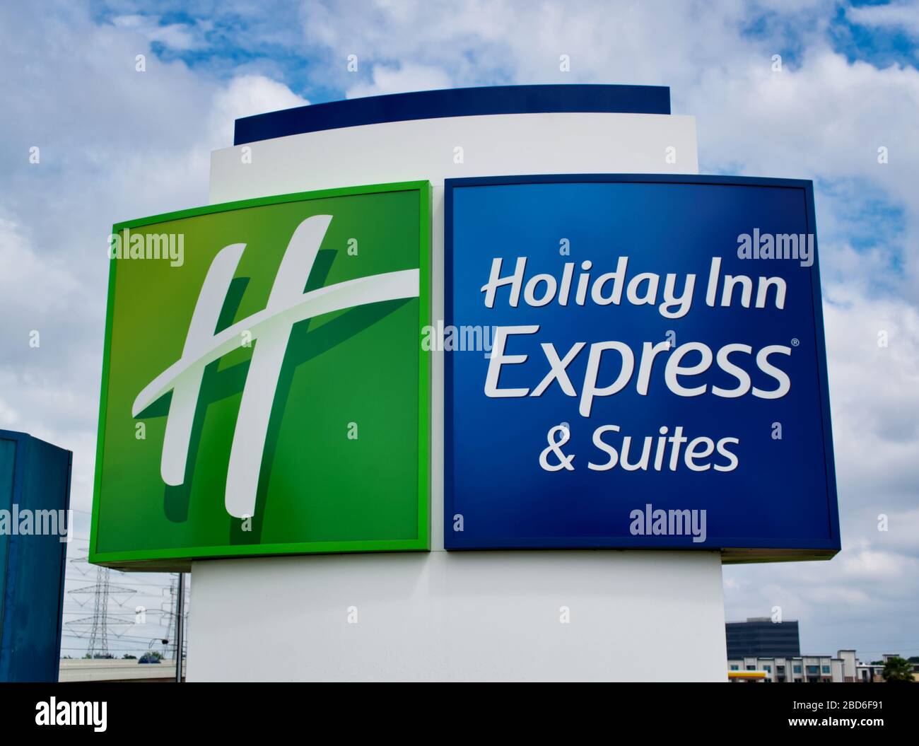 Holiday Inn Express road sign in Houston, TX. Motel chain with Green