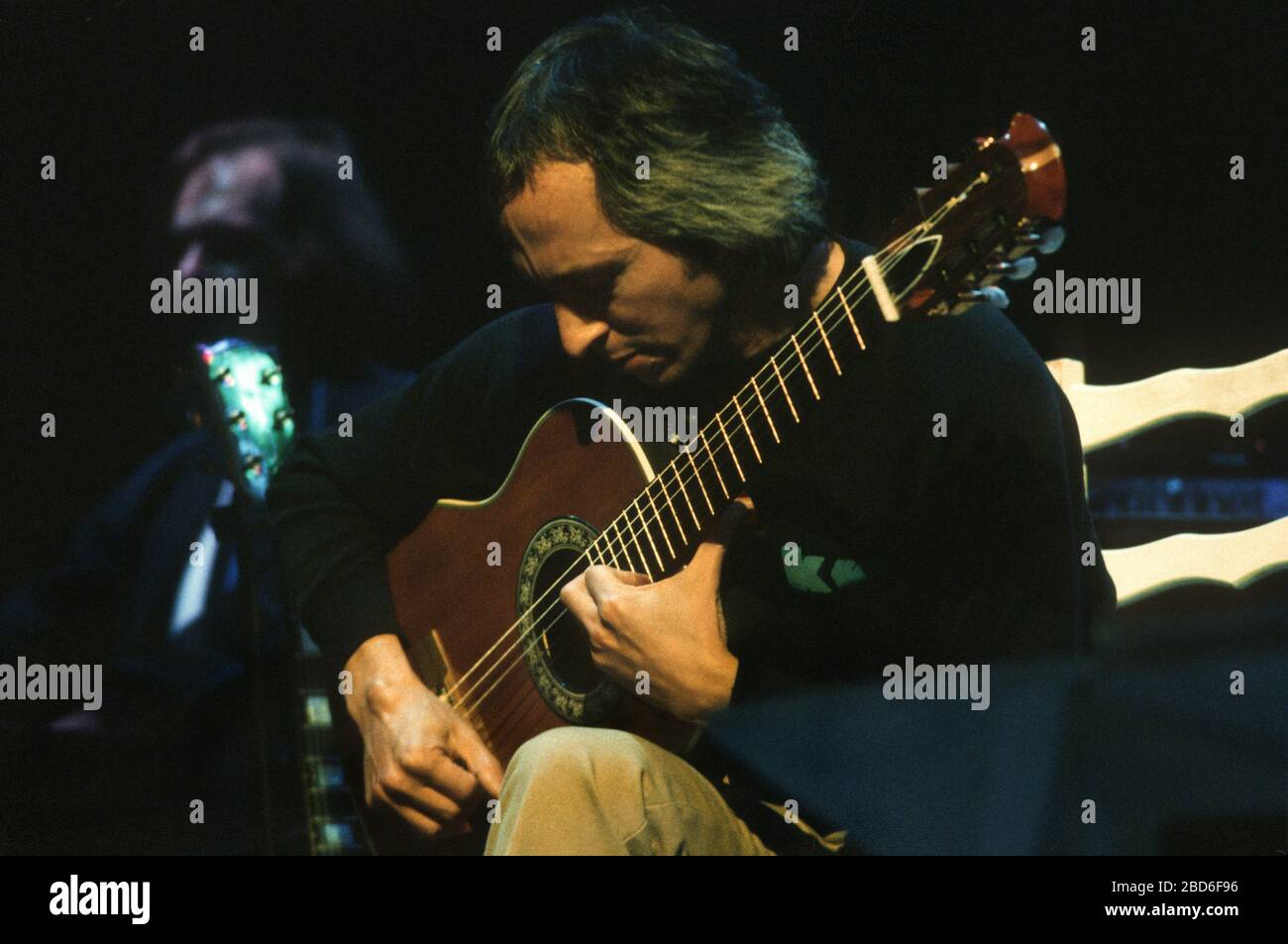 Classical guitarist John Williams performing in concert with Classical guitarist John Williams performing in concert with