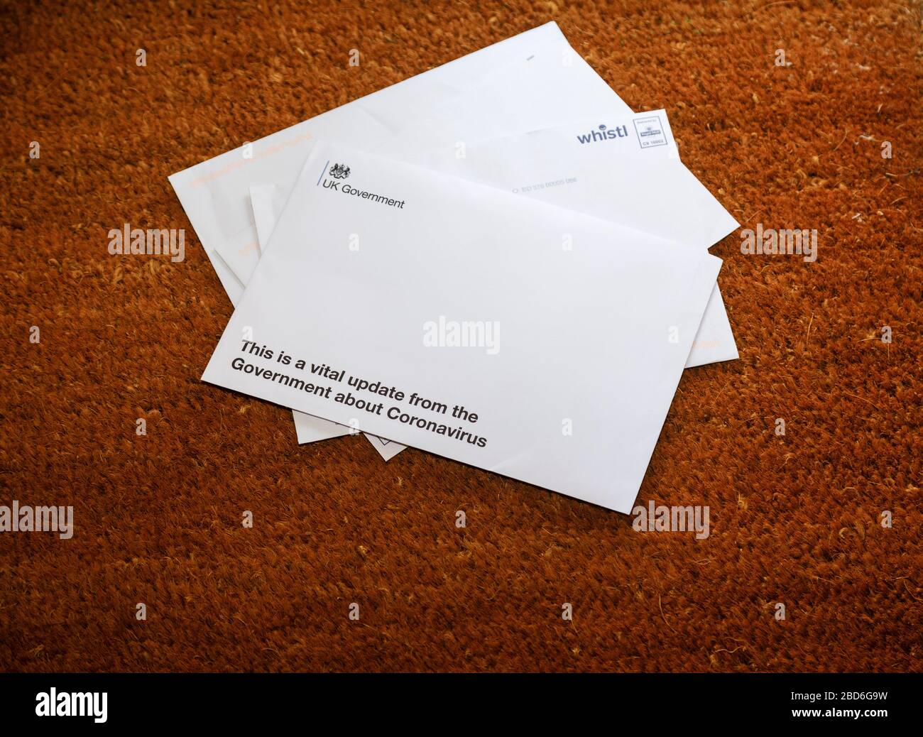 Coronavirus pandemic:  a letter and booklet with advice and instructions from the UK Government are delivered by post to every home Stock Photo