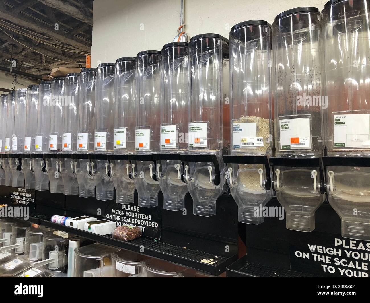 Manhattan, New York, USA. 2020. Mostly empty food dispensers in a Manhattan store during the  Coronavirus lockdown period. Stock Photo