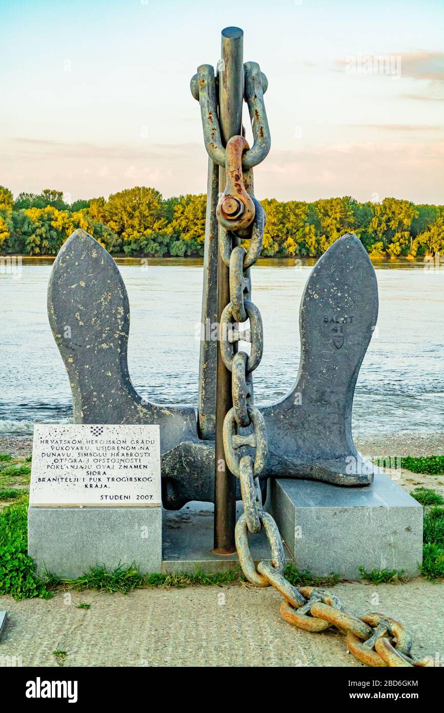 A memorial made of an anchor on the bank of the River Danube facing Serbia. Vukovar, Croatia. 2017. Stock Photo