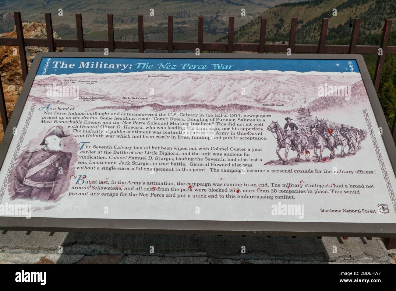Dead Indian Pass, Wyoming / USA - July 14, 2014:  A metal sign explaining the Nez Perce War displayed at the summit of Dead Indian Pass in Wyoming. Stock Photo