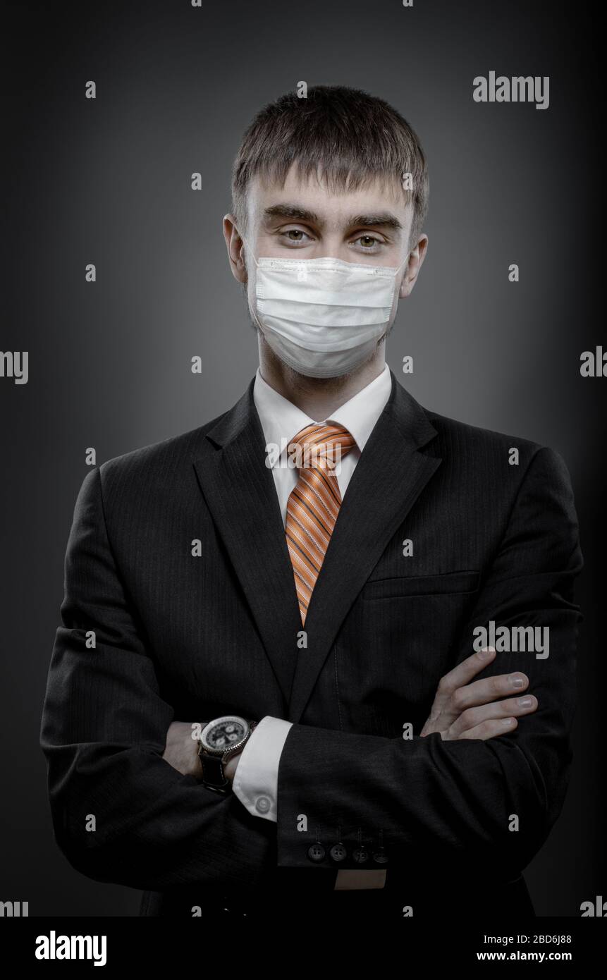 concept coronavirus epidemic, portrait businessman in medical mask Stock Photo
