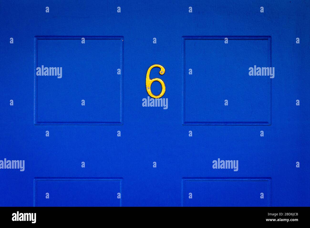 House number 6 on a royal blue door in London Stock Photo Alamy