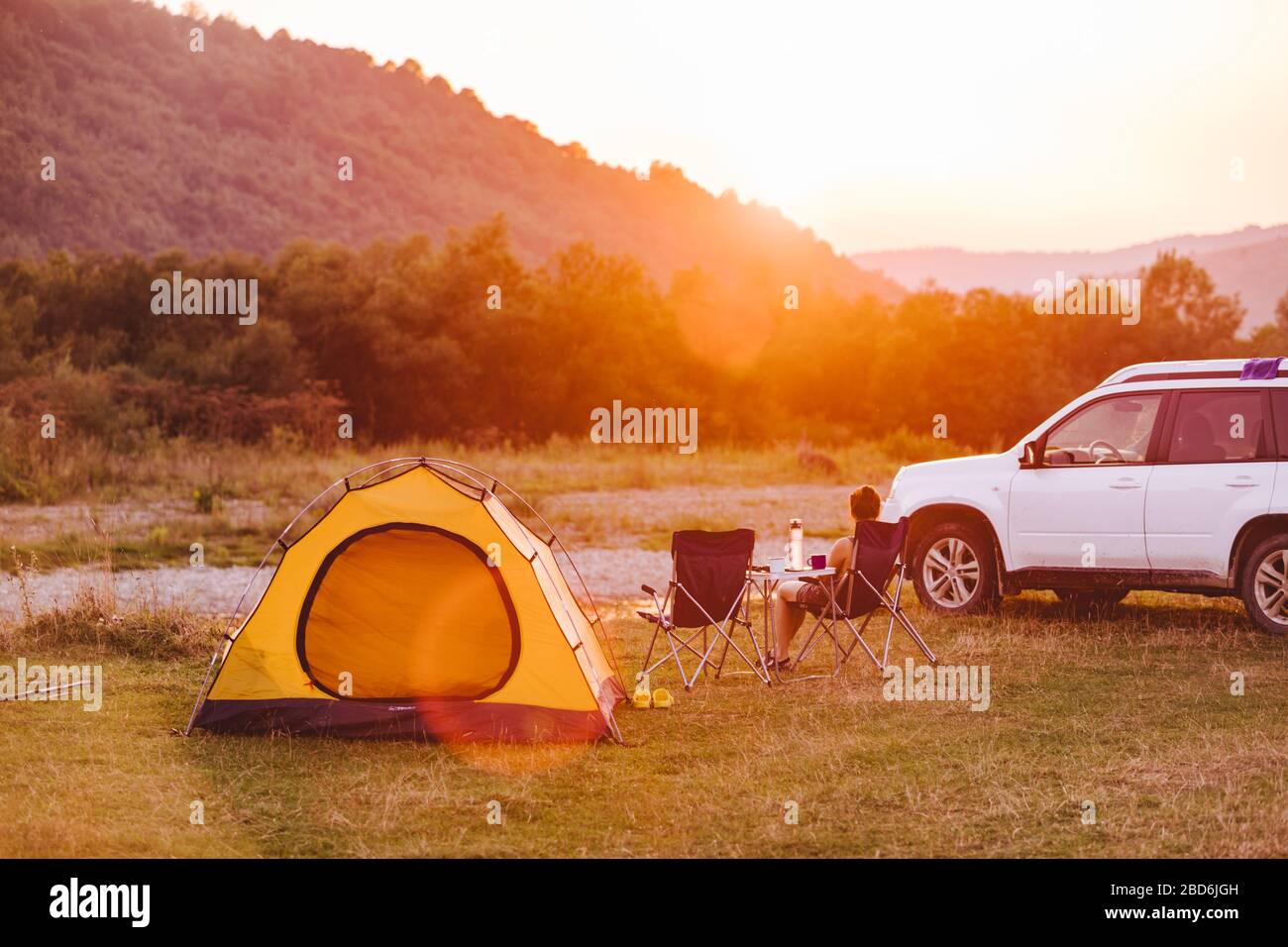 One woman camping sun tent hi-res stock photography and images - Alamy