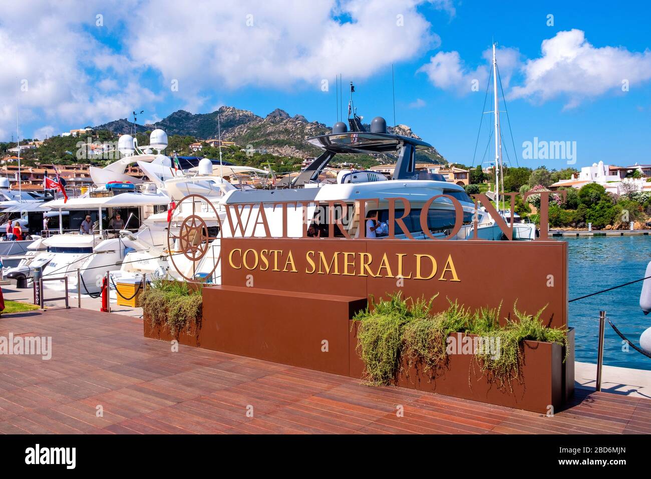 Porto Cervo, Sardinia / Italy - 2019/07/20: Panoramic view of luxury yacht port and marina of Porto Cervo resort at the Costa Smeralda coast Stock Photo