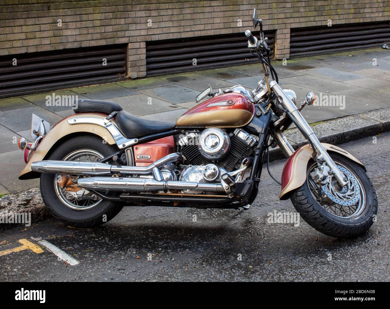 Yamaha Dragstar motorcycle parked in Kensington street, London, UK Stock Photo