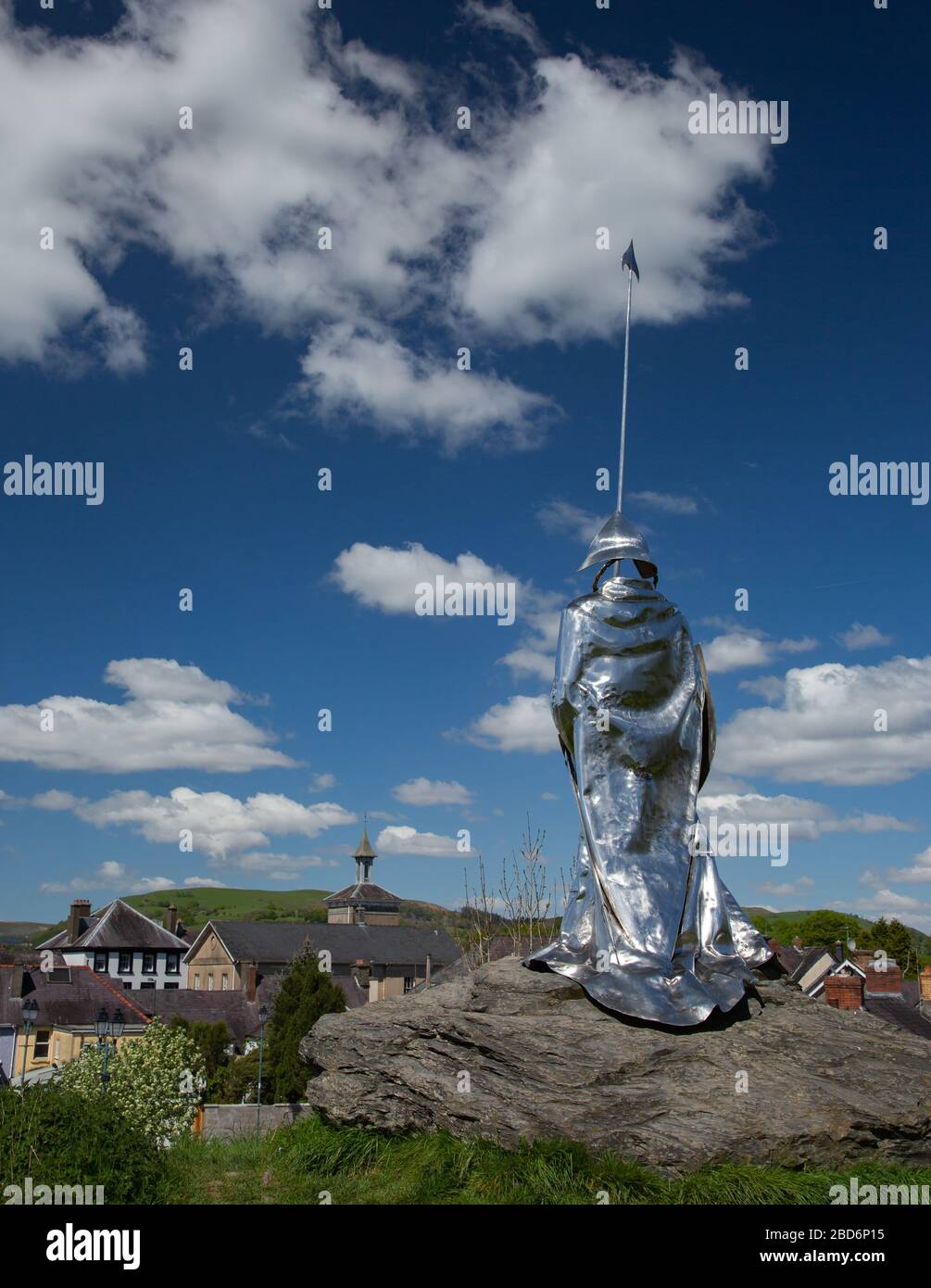 Monument to Llewelyn ap Gruffydd Fychan with town in background at Llandovery Castle, wales Stock Photo