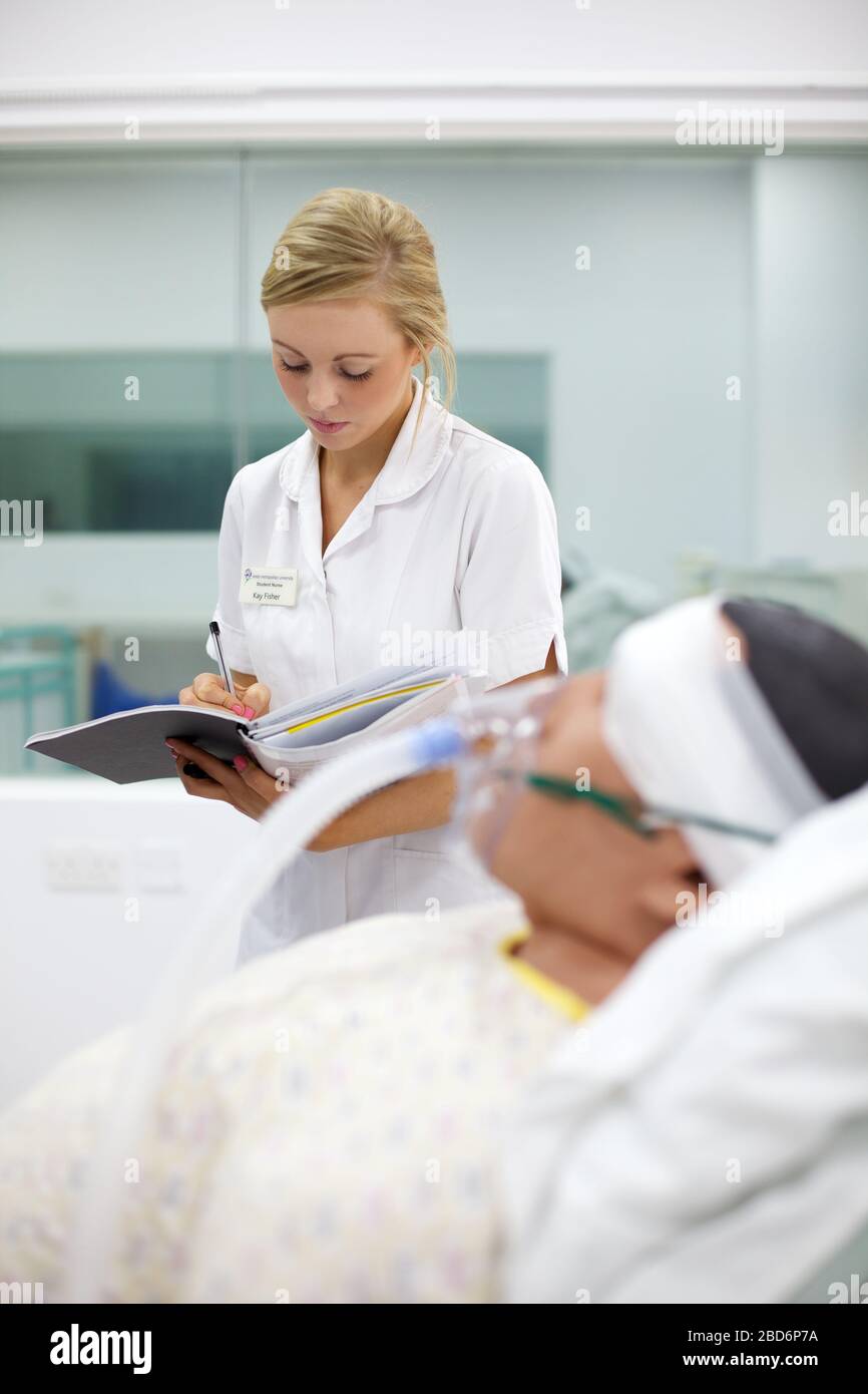 Dummy patient with testing equipment at clinical skill centre Stock
