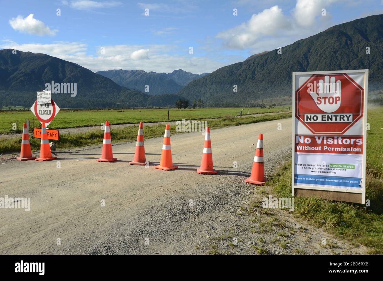 Signage shows that a farm has restricted access during the Covid 19 lockdown in New Zealand, March 2020 Stock Photo