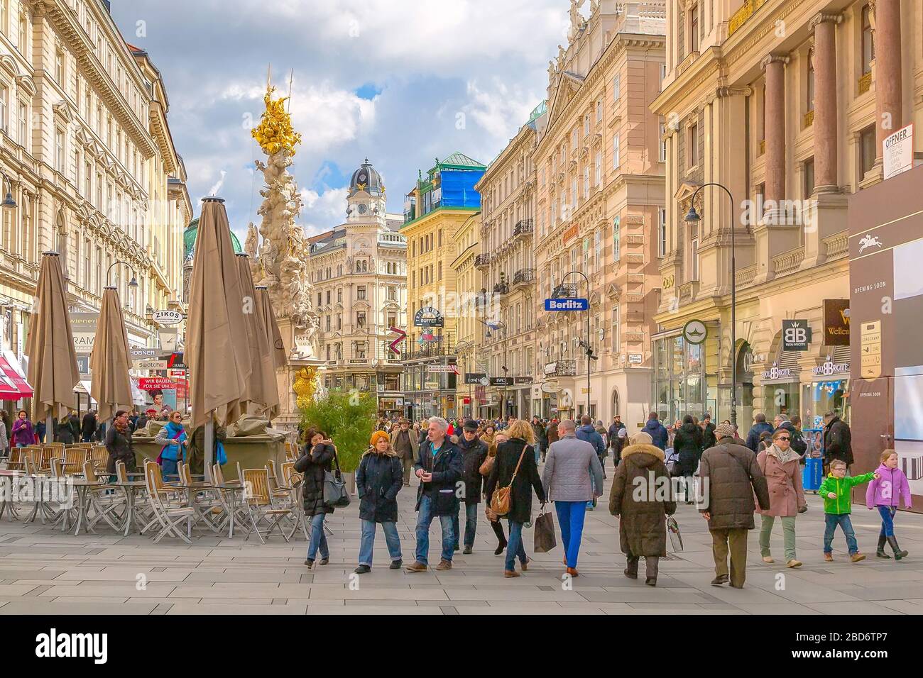 Vienna, Austria - April 3, 2015: Graben street with Plague Column, shops and people Stock Photo