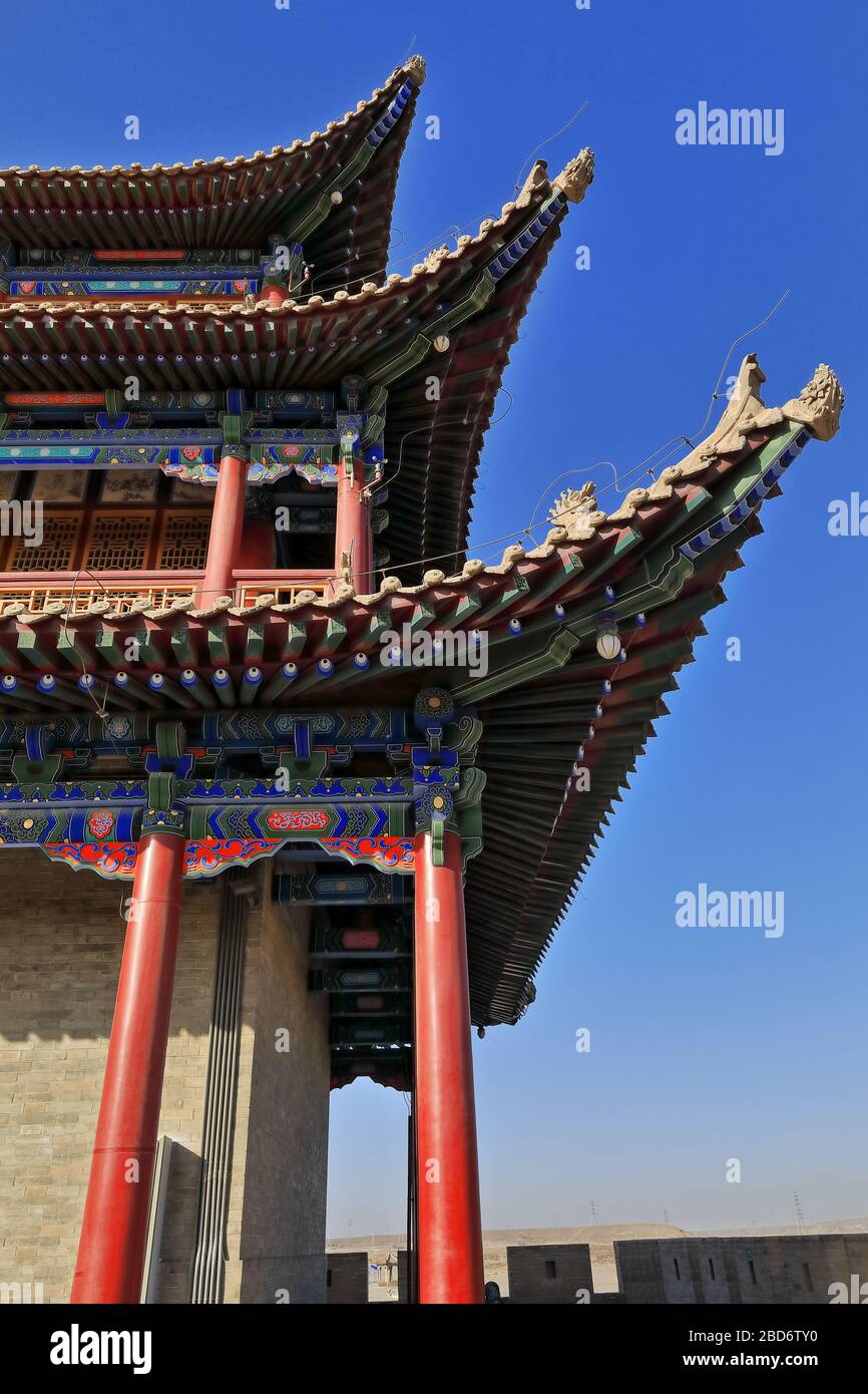 Upturned eaves with chiwen and chishou ornate-Xieshan style roof-Jiayuguan fortress-Gansu-China-0770 Stock Photo