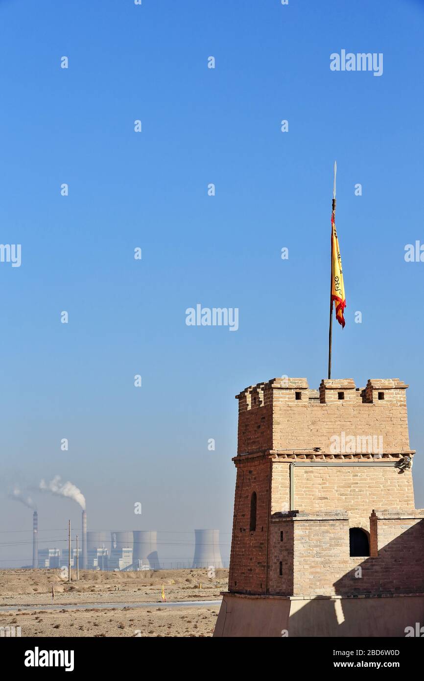 Flag on turret-NW corner inner wall Jiayu Guan Pass-Jiayuguan City-Gansu-China-0773 Stock Photo