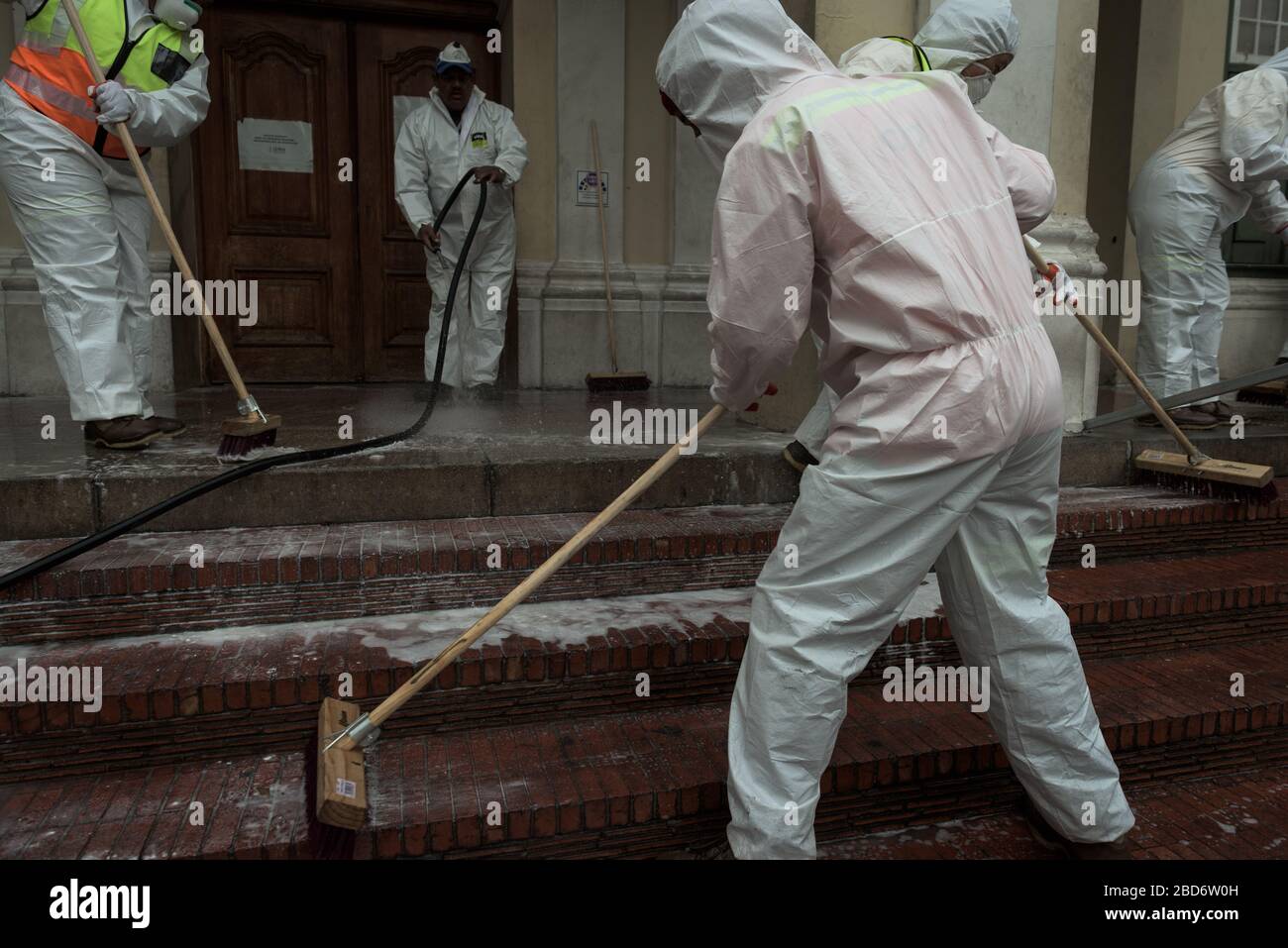 Cape Town's Greenmarket Square disinfected after the forced removal of African foreign national refugees during South Africa's coronavirus response Stock Photo