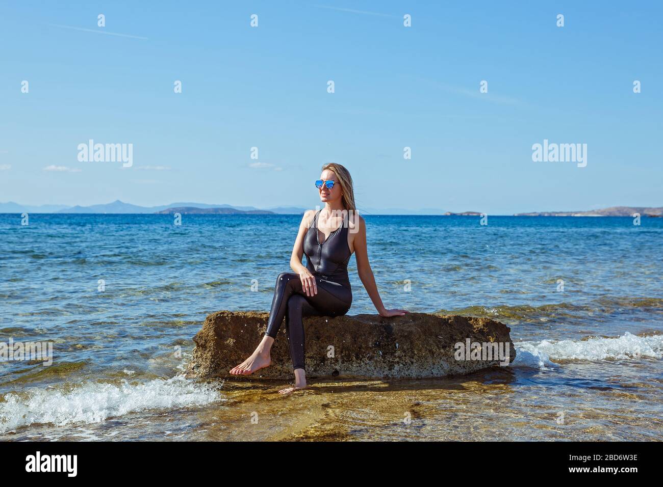 Boulder in the sea hi-res stock photography and images - Alamy